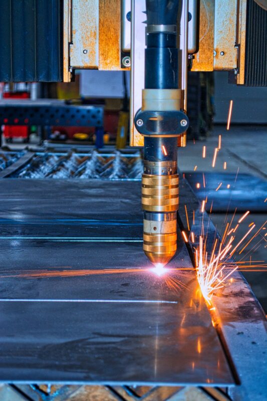 Vertical shot of the modern laser cutter in the factory